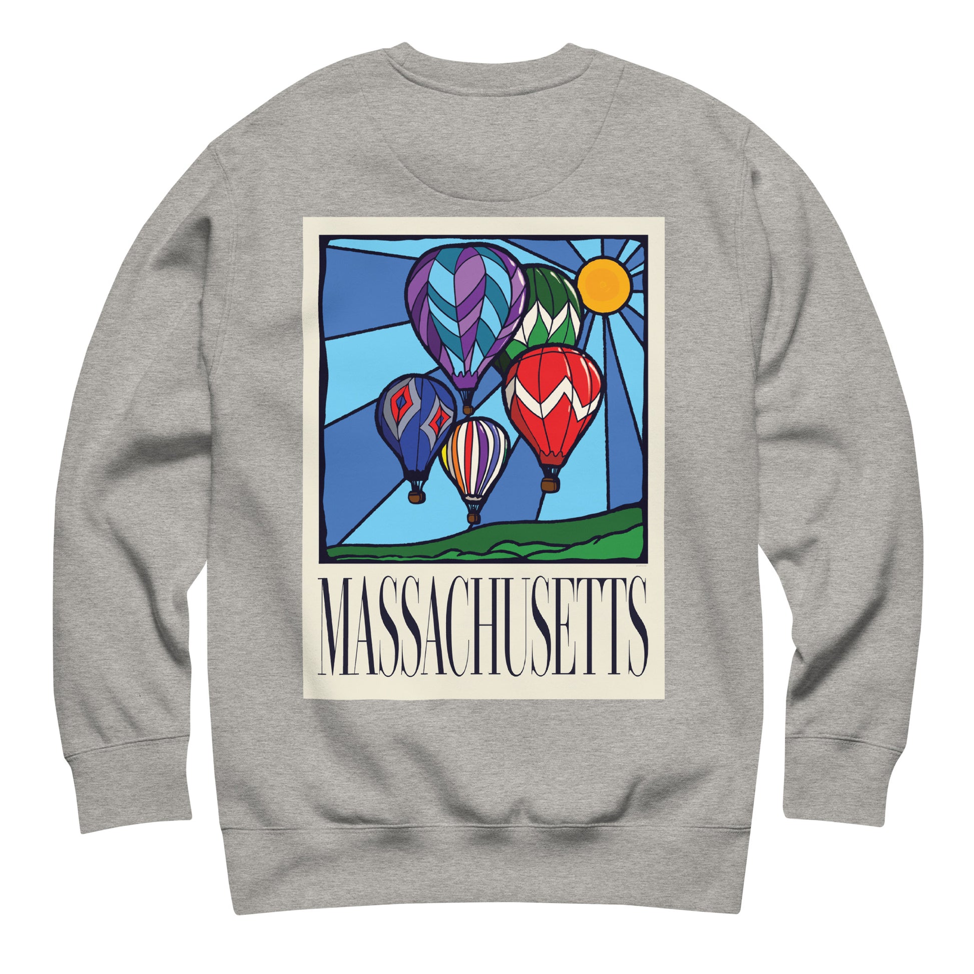Carbon grey colored Massachusetts sweatshirt laid flat, back view showing a large hand-drawn illustration of colorful hot air balloons and a bright sun over green hills, with the word ‘Massachusetts’ in serif font in Navy print below.