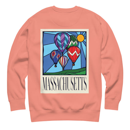 Dusty rose Massachusetts sweatshirt laid flat, back view showing a large hand-drawn illustration of colorful hot air balloons and a bright sun over green hills, with the word ‘Massachusetts’ in serif font below.